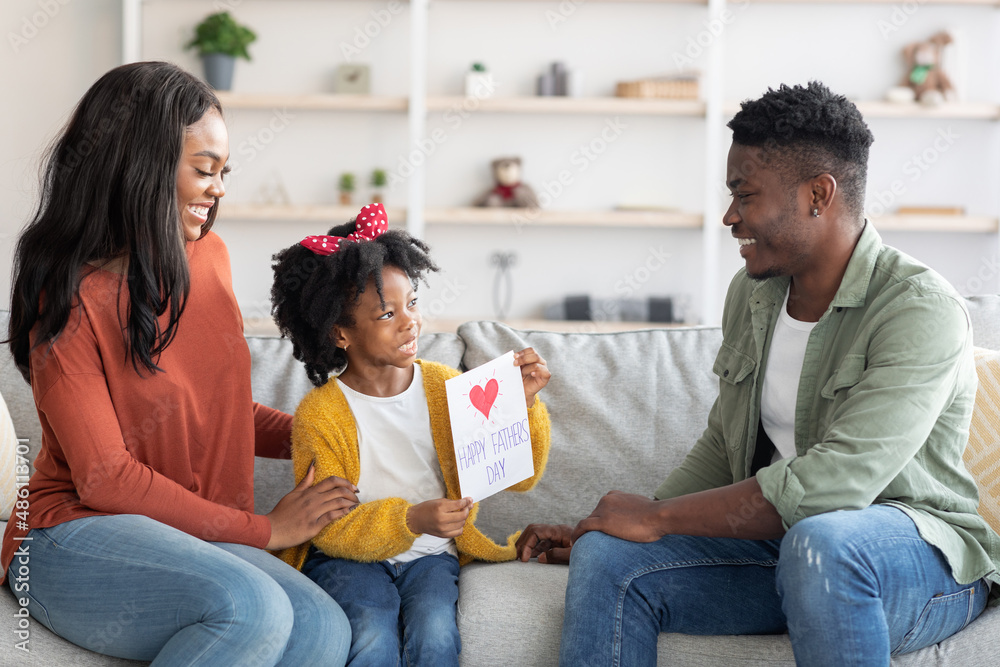 Little Black Daughter Making Surprise For Her Dad At Home Little Black Daughter Making Surprise For Her Dad At Home