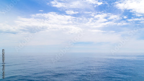 Blue sea water surface on sky