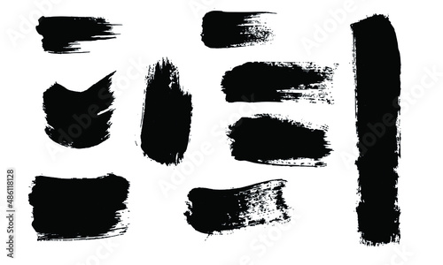 Vector brushes. Watercolor black paint, brushstroke of different shapes. Design elements in the grunge style, hand-drawn. Text frames, background, texture for advertising on a white background. 