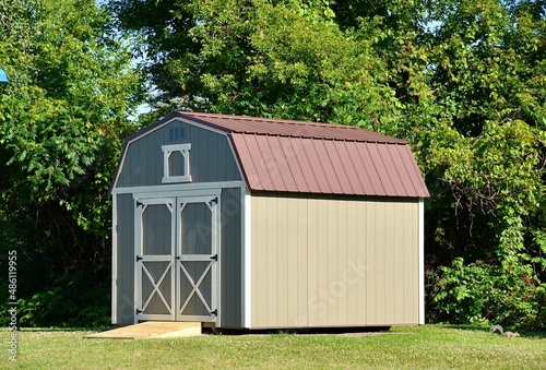 Outdoor storage shed. American shed is typically a simple, single-story roofed structure in a back garden or on an allotment that is used for storage, hobbies, or as a workshop.	