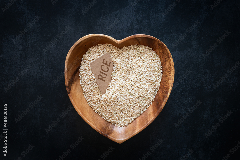 Heart-shaped bowl with brown rice Heart-shaped bowl with brown rice