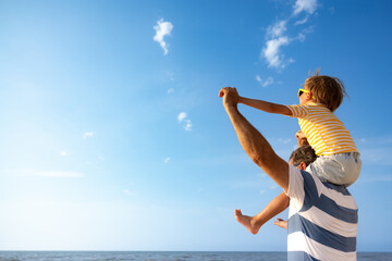 Happy family having fun on summer vacation