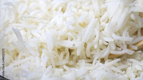 Slow motion of cooked white rice