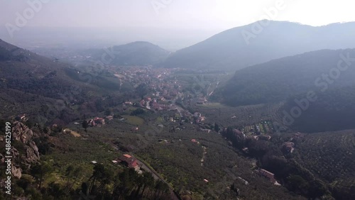 Aerial view of town amidst beautiful mountains, the natural scenery of the Pisa