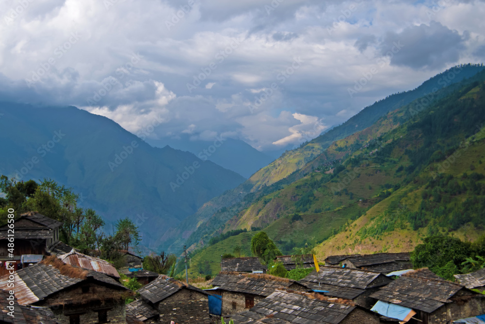 Obraz premium Mountain views of the Tatopani area during trekking around Annapurna (Annapurna Circuit), village with mountains in background. Himalaya, Nepal.