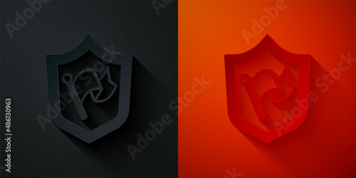 Paper cut Shield with flag icon isolated on black and red background. Victory, winning and conquer adversity concept. Paper art style. Vector