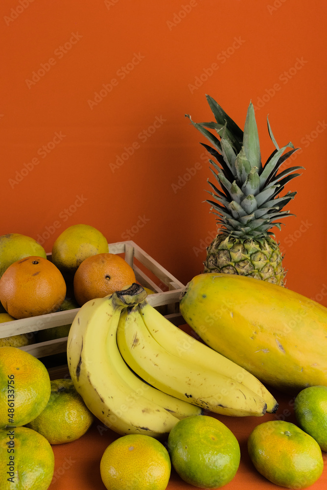 healthy fruits for the human being. papayas, oranges, cucumber, plums, bananas, passion fruit, pineapples. set of fruits to prepare juices. healthy fruits for the human being. papayas, oranges, cucumber, plums, bananas, passion fruit, pineapples. set of fruits to prepare juices.