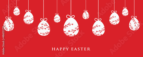 Easter banner with hanging eggs decoration on red background.