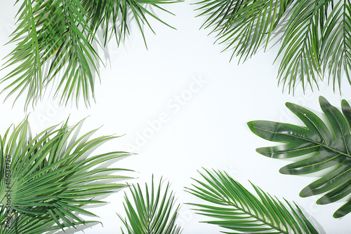 Fototapeta Naklejka Na Ścianę i Meble -  Summer composition, Abstract background with tropical palm leaves on sunny table, summer holiday concept, banner, flat lay, space for text, selective focus