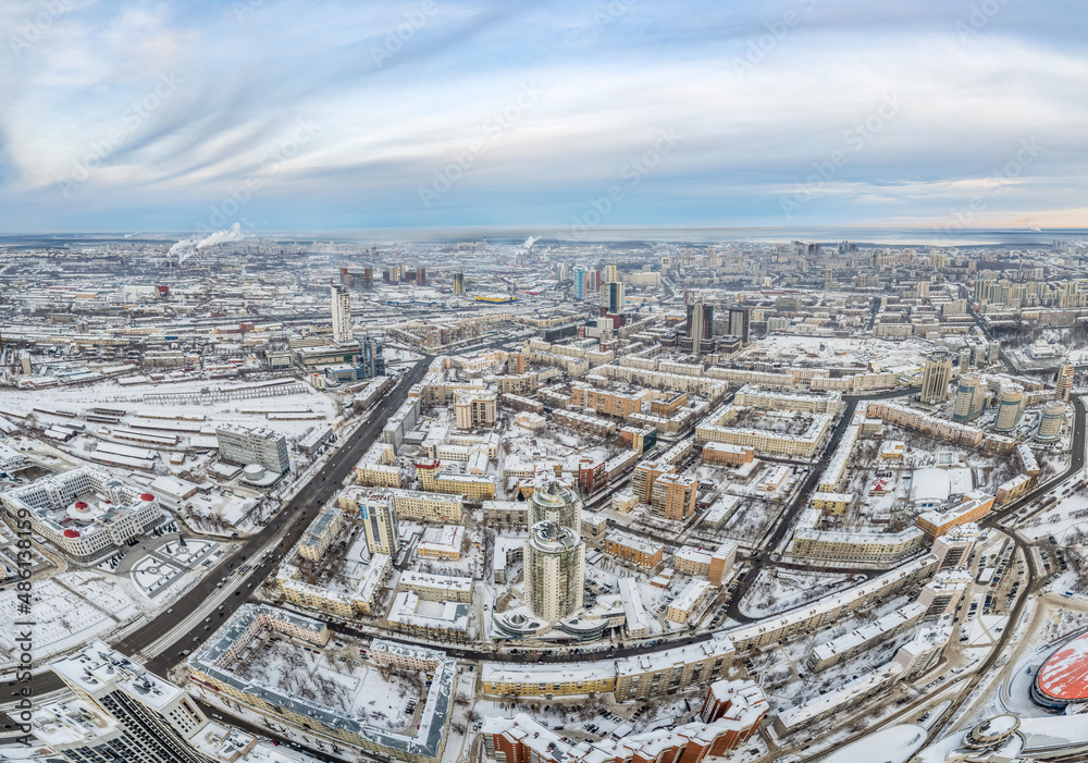 Yekaterinburg aerial panoramic view at Winter in cloudy day. Chelyuskintsev street and Krasnyy Pereulok street.