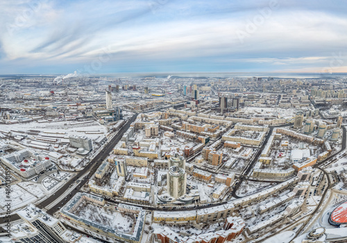 Yekaterinburg aerial panoramic view at Winter in cloudy day. Chelyuskintsev street and Krasnyy Pereulok street. photo