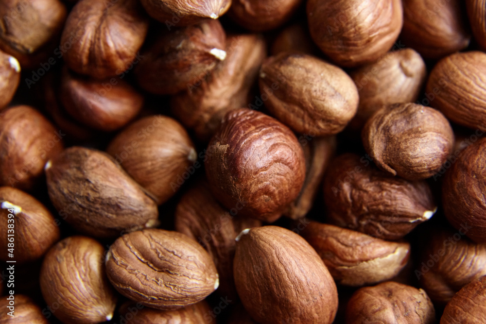 Shelled raw hazelnuts background closeup Shelled raw hazelnuts background closeup
