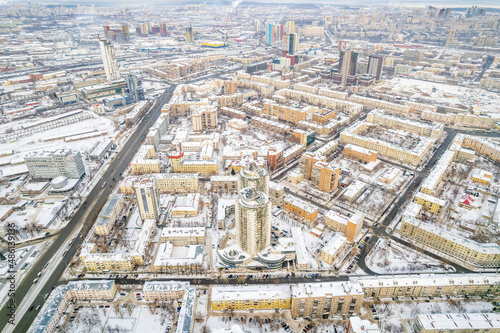 Yekaterinburg aerial panoramic view at Winter in cloudy day. Chelyuskintsev street and Krasnyy Pereulok street. © Dmitrii Potashkin
