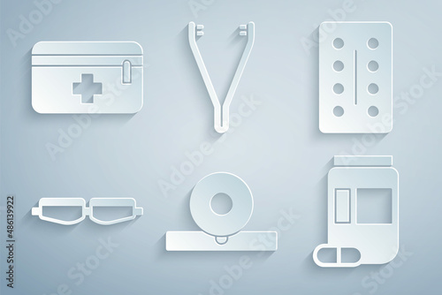 Set Otolaryngological head reflector, Pills in blister pack, Safety goggle glasses, Medicine bottle and pills, Medical tweezers and First aid kit icon. Vector