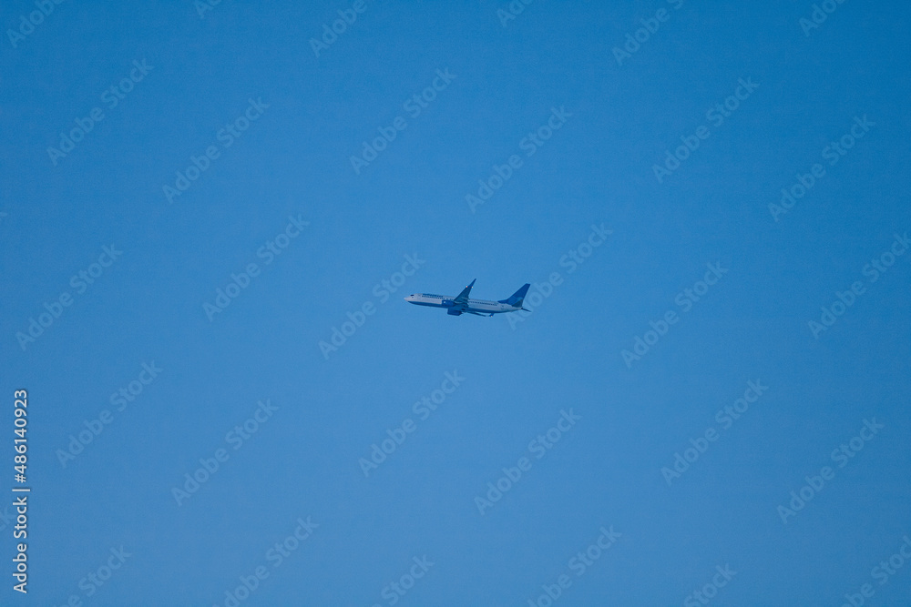 plane flies in the sky plane flies in the sky