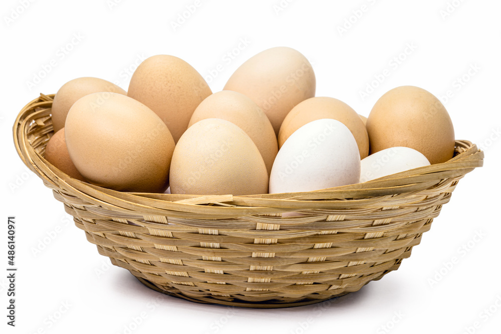 Brazilian free-range chicken eggs in rustic wooden bowl with white background and copyspace Brazilian free-range chicken eggs in rustic wooden bowl with white background and copyspace