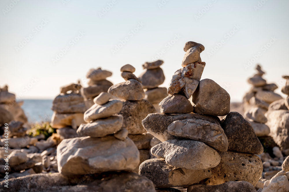 Hand made rock formation on the gravel shore at the town of Rovinj, Croatia Hand made rock formation on the gravel shore at the town of Rovinj, Croatia