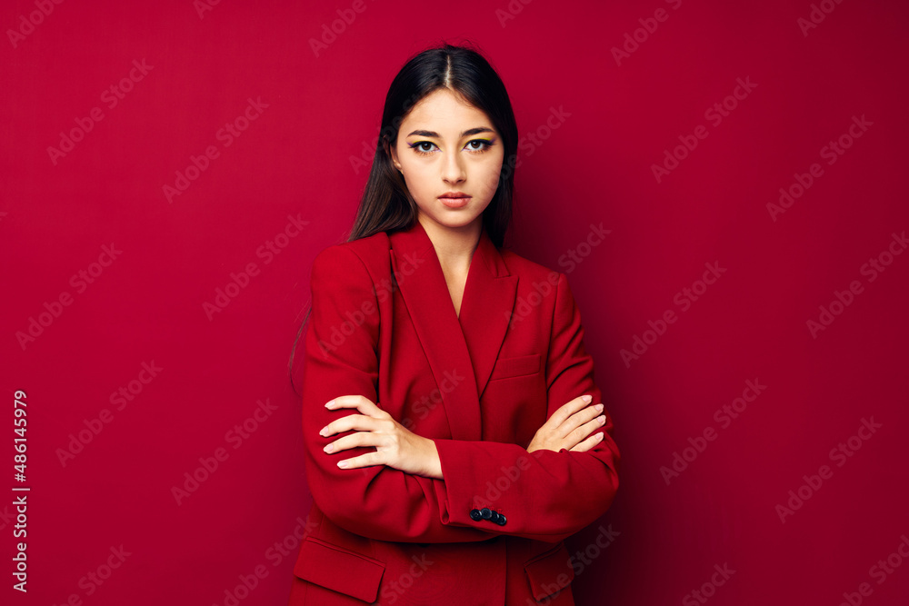portrait pretty woman attractive look glamor cosmetics fashion red background unaltered portrait pretty woman attractive look glamor cosmetics fashion red background unaltered