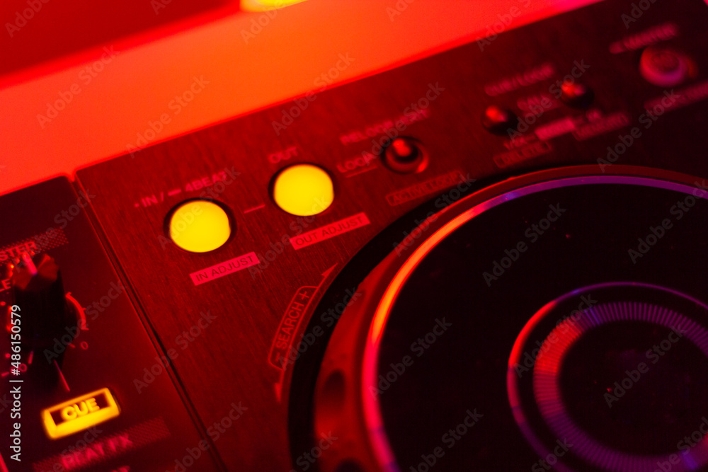 Fototapeta premium DJ mix studio audio tracks mixing buttons pads decks mixing console frequencies