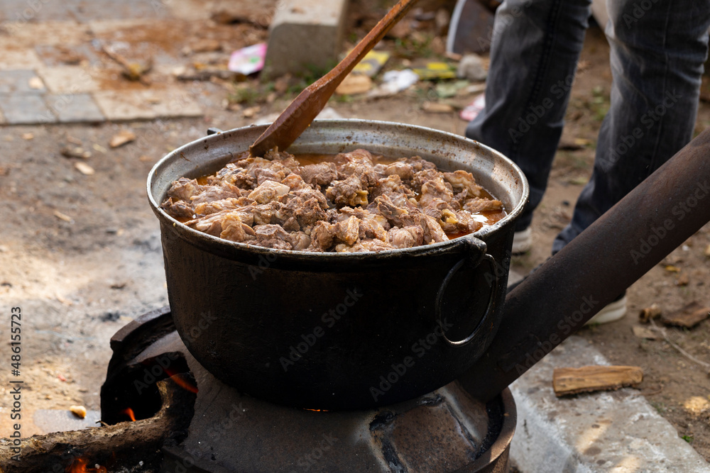 Kavurma is a Turkic sheep meat dish. Pieces of meat are stewed in a large cauldron over an open fire. Kavurma is a Turkic sheep meat dish. Pieces of meat are stewed in a large cauldron over an open fire.