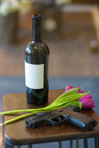 Dark bottle of wine on the table for a romantic date
