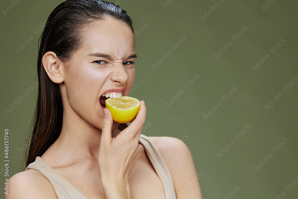 beautiful woman lemon vitamins health cosmetology green background beautiful woman lemon vitamins health cosmetology green background