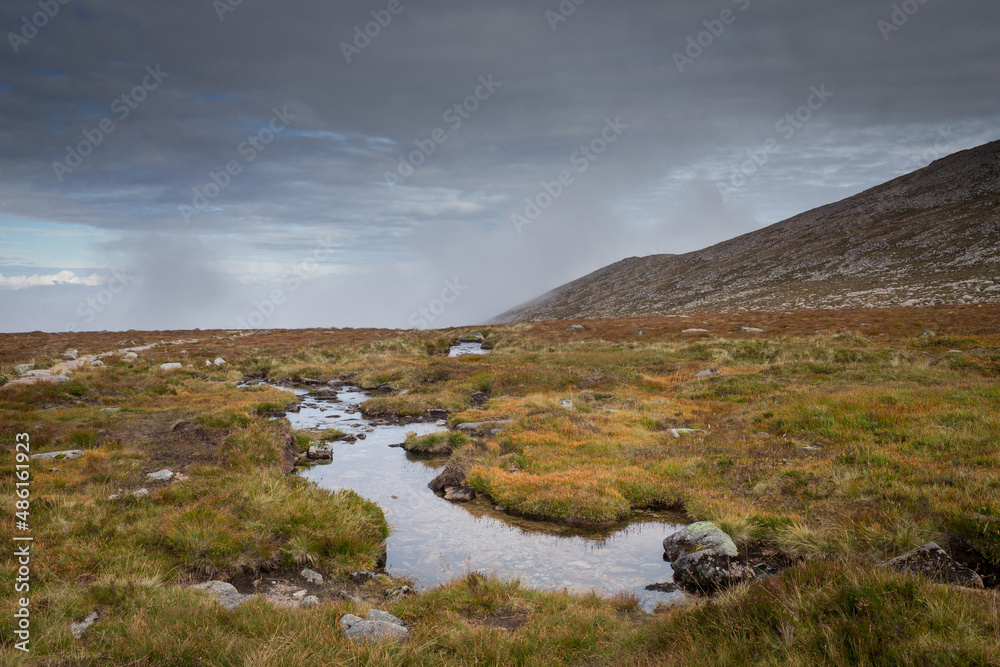 landscape with mountains and clouds Cairngorms National Park Scotland 