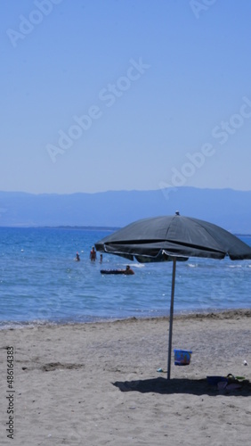 Wicker umbrellas on the beach