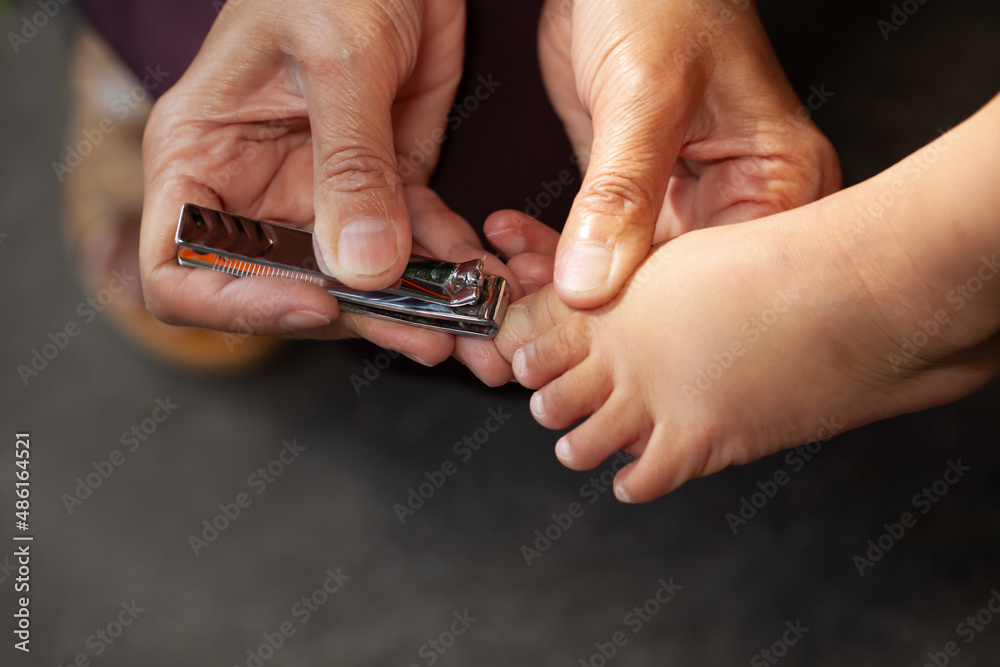 Fototapeta premium cut toenails for childen