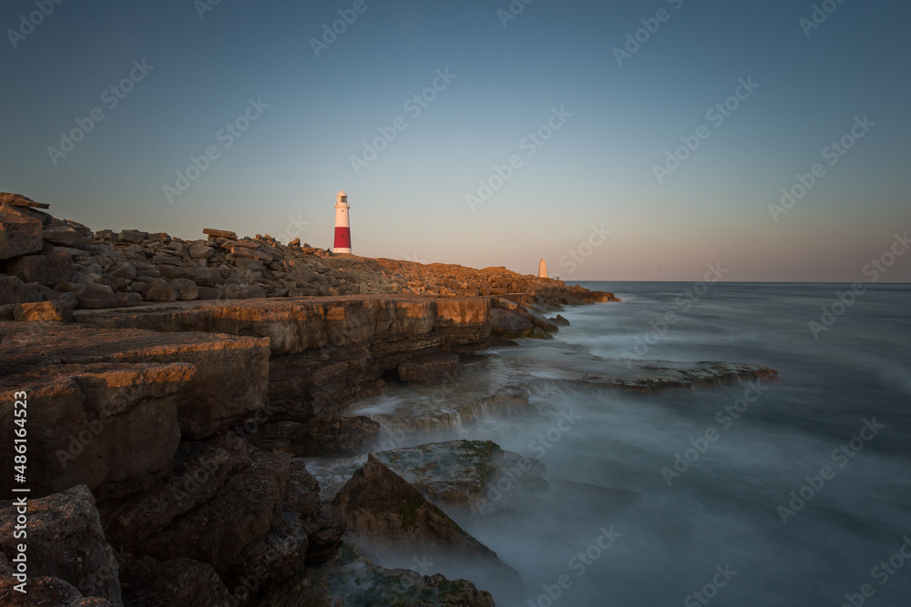 lighthouse at sunset on the coast, Dorset Portland Bill