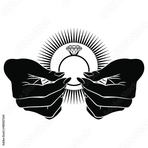 Two human hands holding jeweled engagement ring in shining halo. Creative wedding concept. Black and white silhouette,