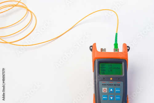 Professional testing of fiber optic connections OTDR meter. Measurement of the throughput of the optical fiber network. Expert work in the IT industry.