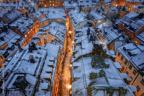 Fototapeta Naklejka Na Ścianę i Meble -  Beautiful view of old town with snowy rooftops