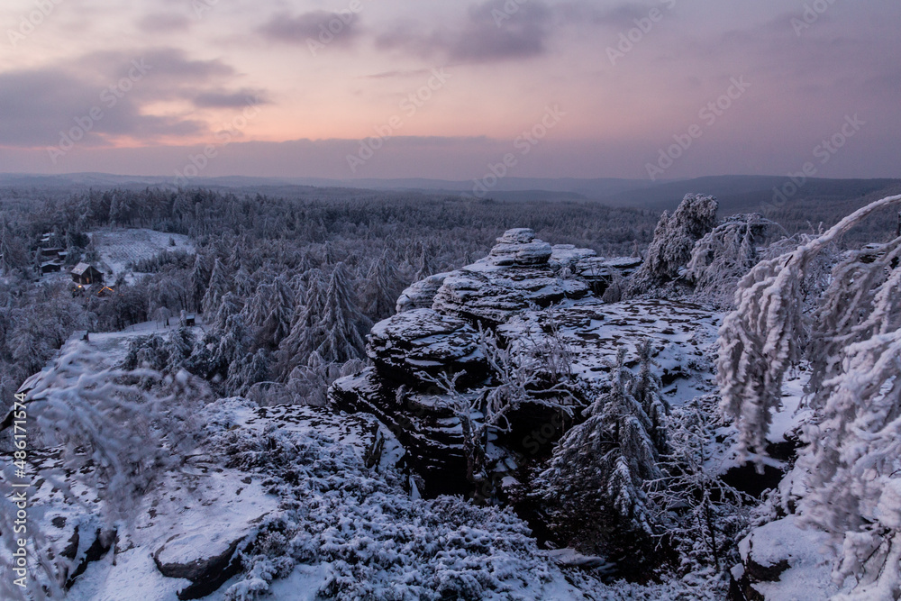 Evening winter view of Tiske steny rocks, Czechia