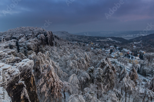 Winter aerial view of Tisa village from  Tiske steny rocks, Czech Republic photo