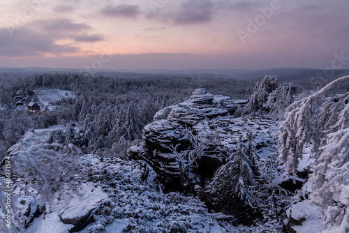 Evening winter view of Tiske steny rocks, Czechia photo