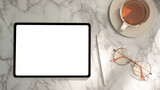 Feminine office desk with tablet blank screen mockup on marble background.