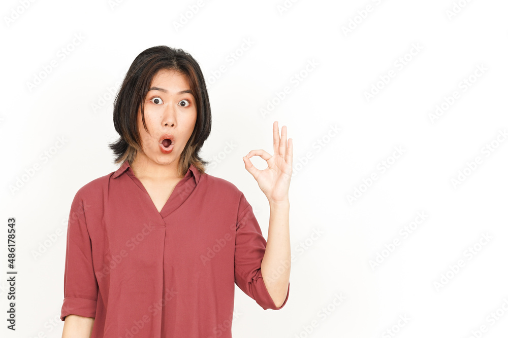 Showing OK Sign Of Beautiful Asian Woman Isolated On White Background Showing OK Sign Of Beautiful Asian Woman Isolated On White Background