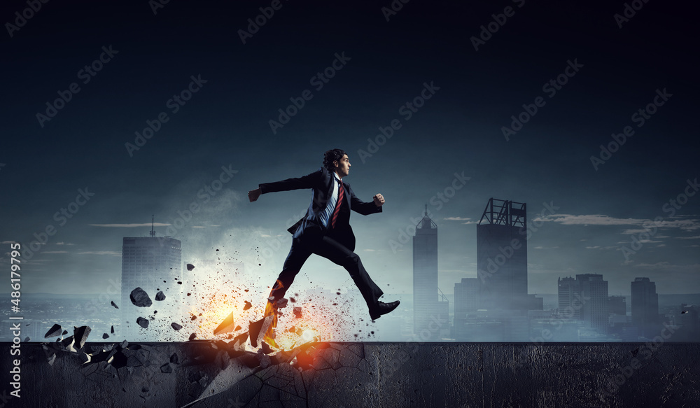 Portrait of energetic businessman running . Mixed media Portrait of energetic businessman running . Mixed media