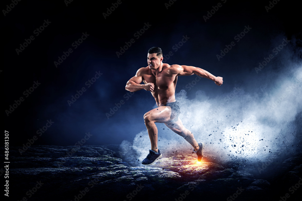 Male runner against dark background