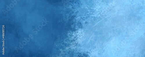 Dark blue and light white blue grunge background abstract marbled stone wall texture and icy pattern in panoramic web header banner backdrop template