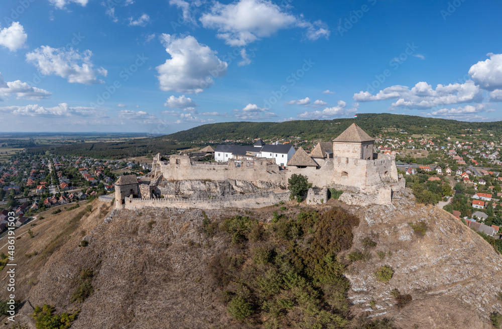 Aerial view of Sumeg castle with newly restored Gothic palace building and corner gun bastion under construction
