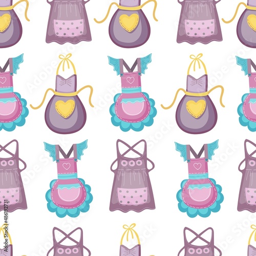 Seamless pattern with aprons for cooking in a cartoon, hand-drawn style.