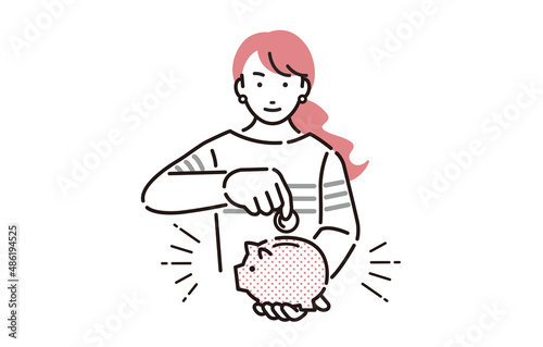 貯金箱にコインを入れる女性