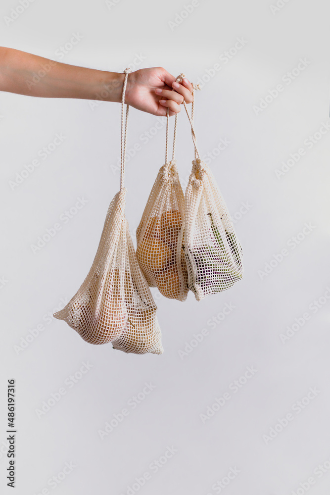 Ecological mesh bags, for the purchase of fruits and vegetables in the market. Ecological mesh bags, for the purchase of fruits and vegetables in the market.