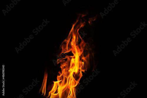 Fire flames on a black background © somchai