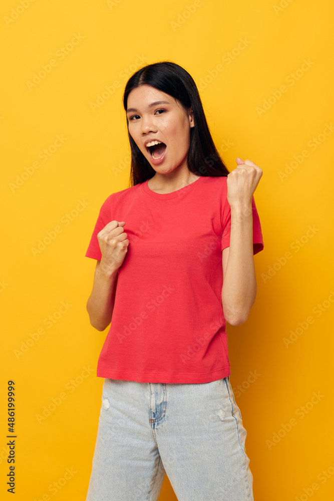 Portrait Asian beautiful young woman gestures with her hands in casual clothes copy-space Lifestyle unaltered Portrait Asian beautiful young woman gestures with her hands in casual clothes copy-space Lifestyle unaltered