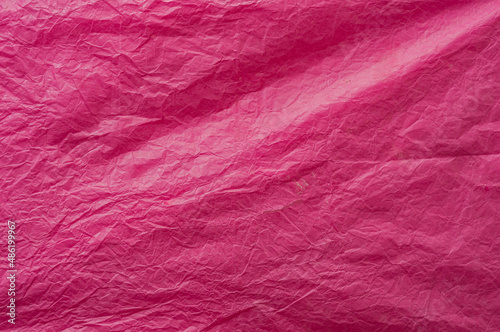 Pink rumpled wrapping paper. Image for background. Place for text