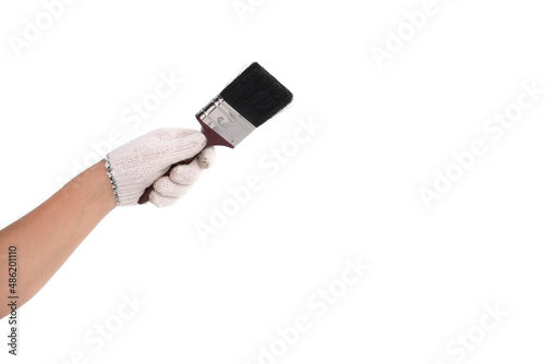 Man hand holding new paintbrush isolated on white background