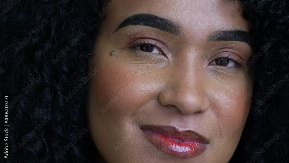 A latina black woman smiling close-up face A latina black woman smiling close-up face